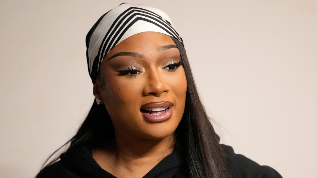 Megan Thee Stallion Nails Peekaboo Bra Trend in Plunging Suit Look