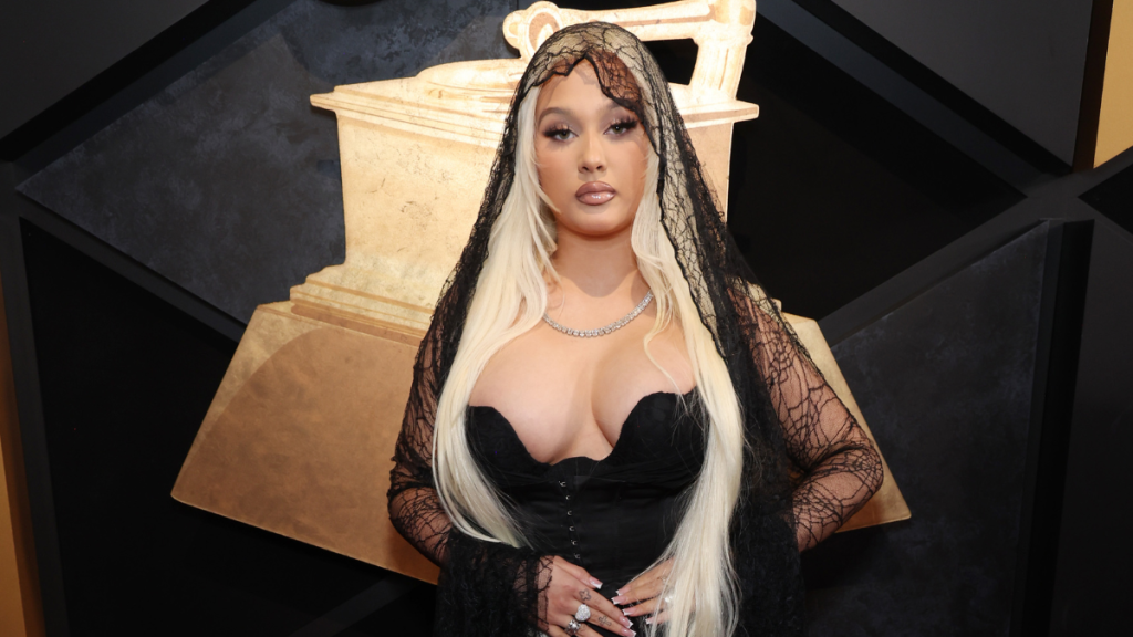 Alabama Barker Gets Wet & Comfy in Fully See-Through Skirt Look