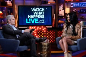Brit Eady and Andy Cohen sitting across from each other on Watch What Happens Live