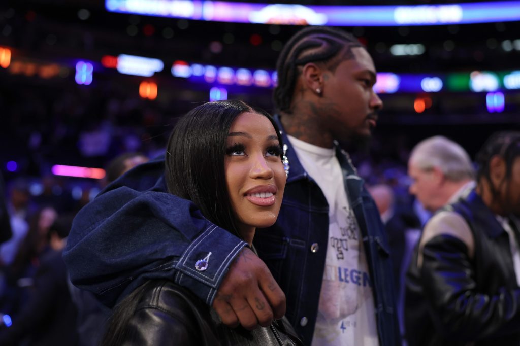 Stefon Digs with his arm around Cardi B at a New York Knicks game