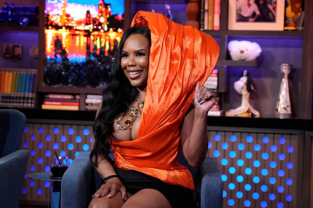 Kelli Potter in an orange hood on Watch What Happens Live