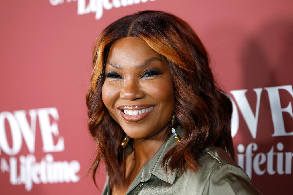 Mona Scott Young smiling at a Lifetime event