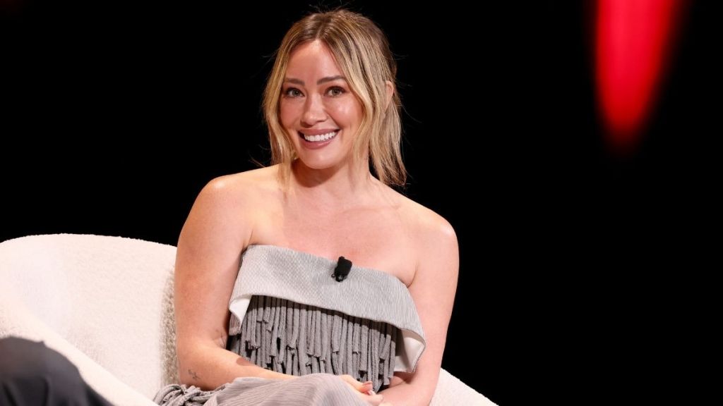 Hilary Duff's Red Swimsuit Daringly Slips Off Her Shoulders