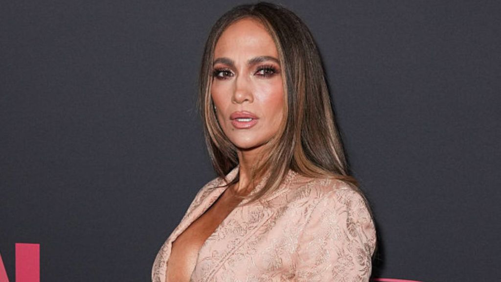 Jennifer Lopez Turns up the Temperature in Plunging Lacy Cami Top