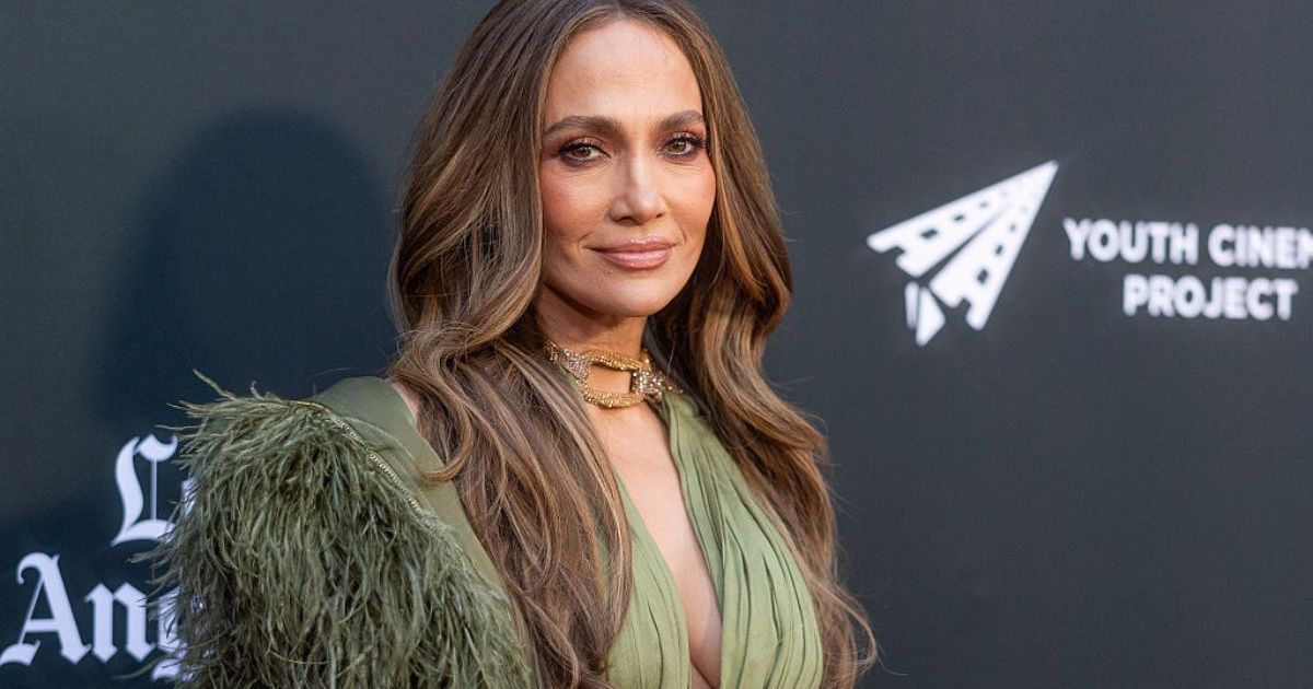 Jennifer Lopez Wears a Plunging Dress With So Many Cut-Outs It's Barely Holding Together