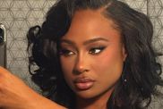 Travis Kelce’s Ex Turns Heads in Slit Dress That Puts Her Legs Fully on Display