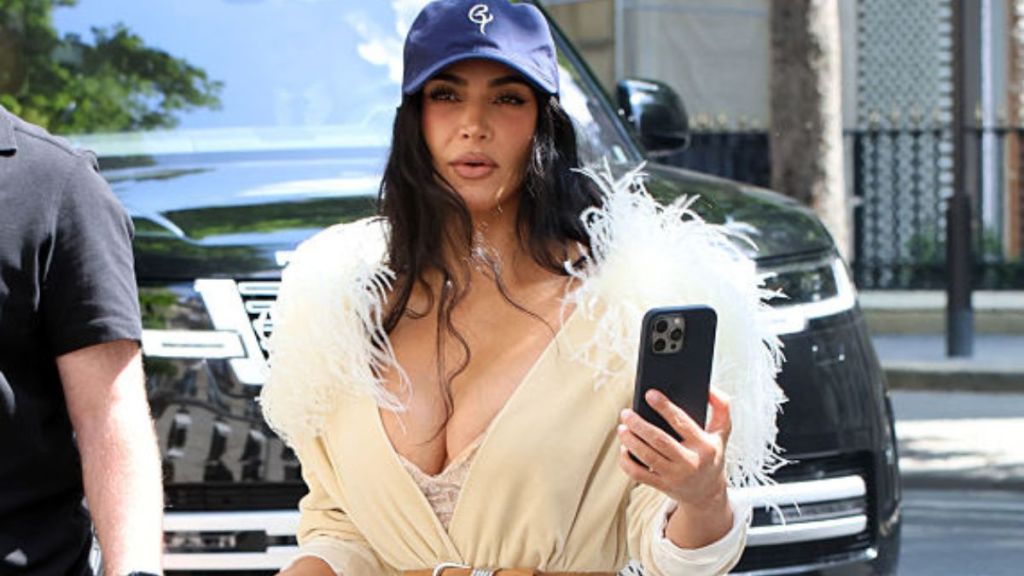 Kim Kardashian Makes Plunging Lace Dress Riskier Than Ever in Selfie
