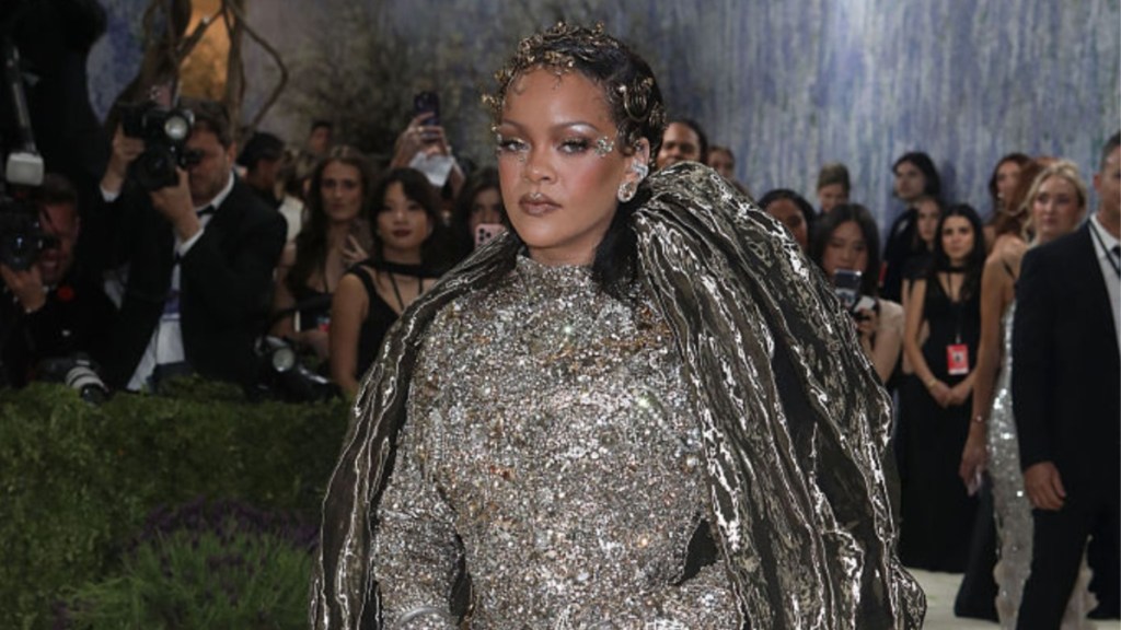 Rihanna's Lacy Lingerie Peeks Through Robe as She Gets Ready for Met Gala