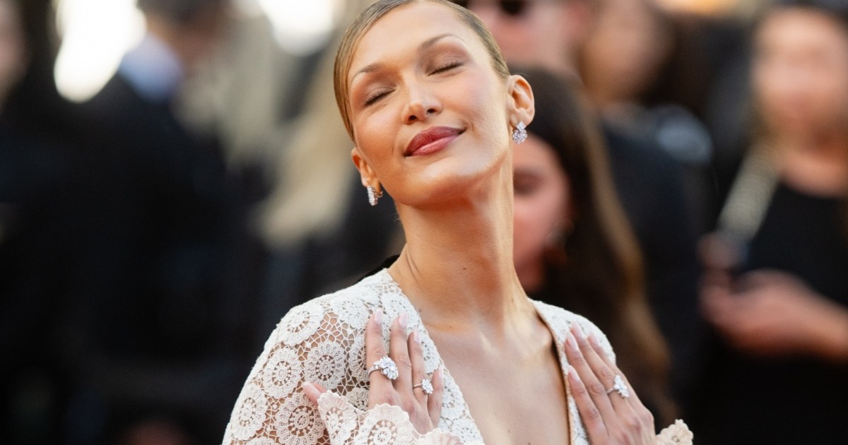 Bella Hadid’s See-Through Schiaparelli Lace Gown Also Has a Plunging Neckline Bella Hadid’s See-Through Schiaparelli Lace Gown Also Has a Plunging Neckline