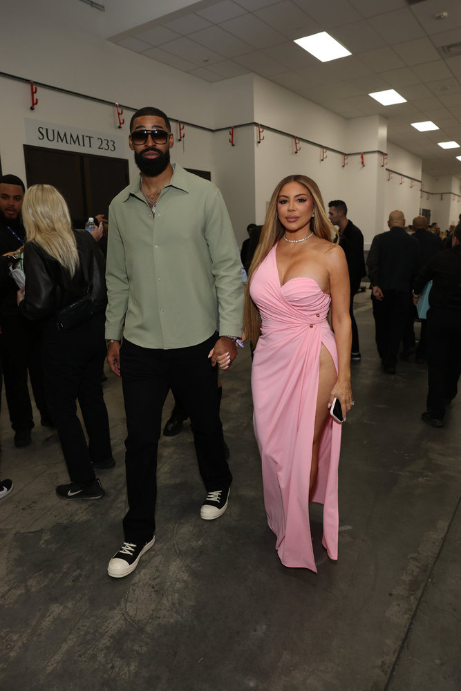 Jeff Coby and Larsa Pippen walking backstage at BravoCon