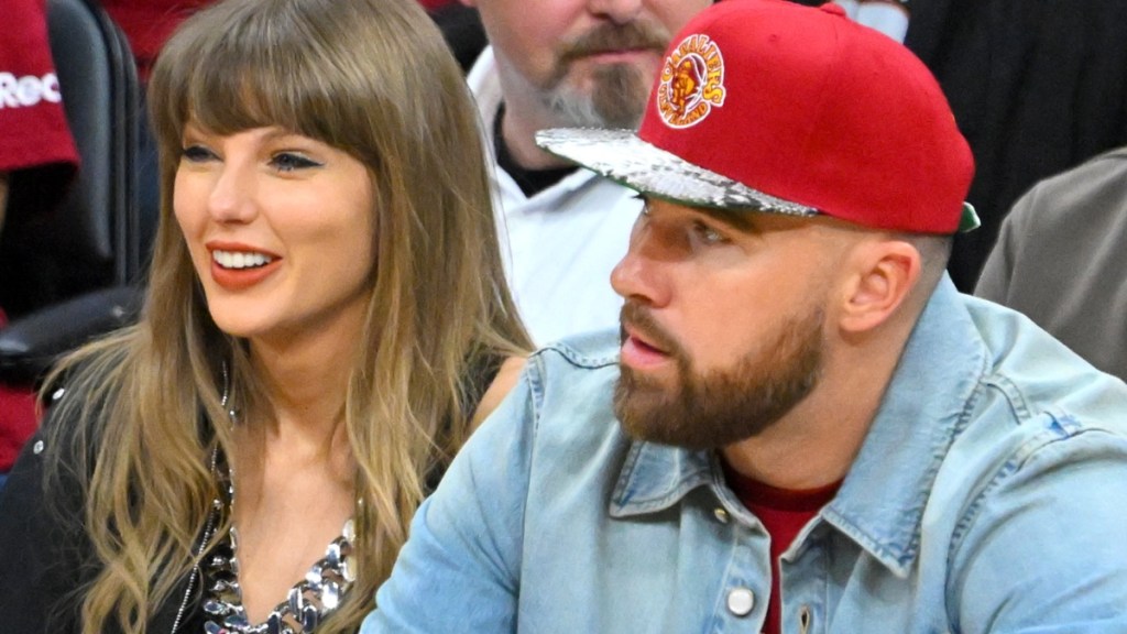 Travis Kelce’s Courtside Beer Chug Draws Reaction From Taylor Swift