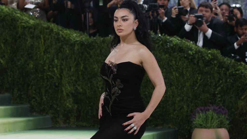 Charli XCX Goes Pantless Under Saint Laurent Cami Top Hanging by Strings
