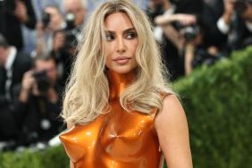 Kim Kardashian’s Cleavage-Baring Robe Is a Little Too Loosely Tied