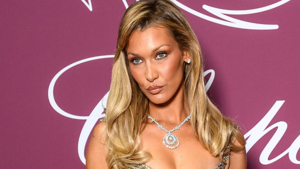 Bella Hadid Stretches in Cheeky Metallic Thong Bikini