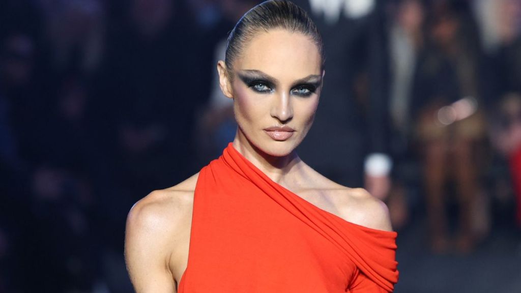 Candice Swanepoel Strikes a Steamy Pose in Bralette & Sheer Tights