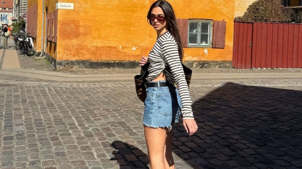 Dua Lipa Flaunts Toned Abs in Lifted Top Moment