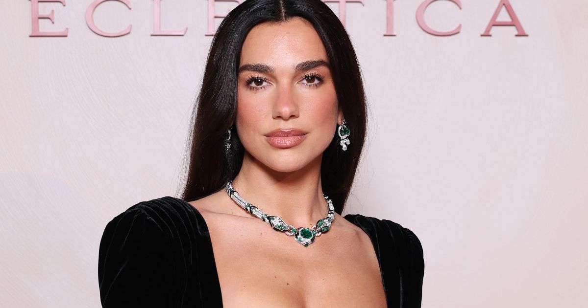 Dua Lipa’s Coperni Bra Top & Lace Skirt Are Completely See-Through