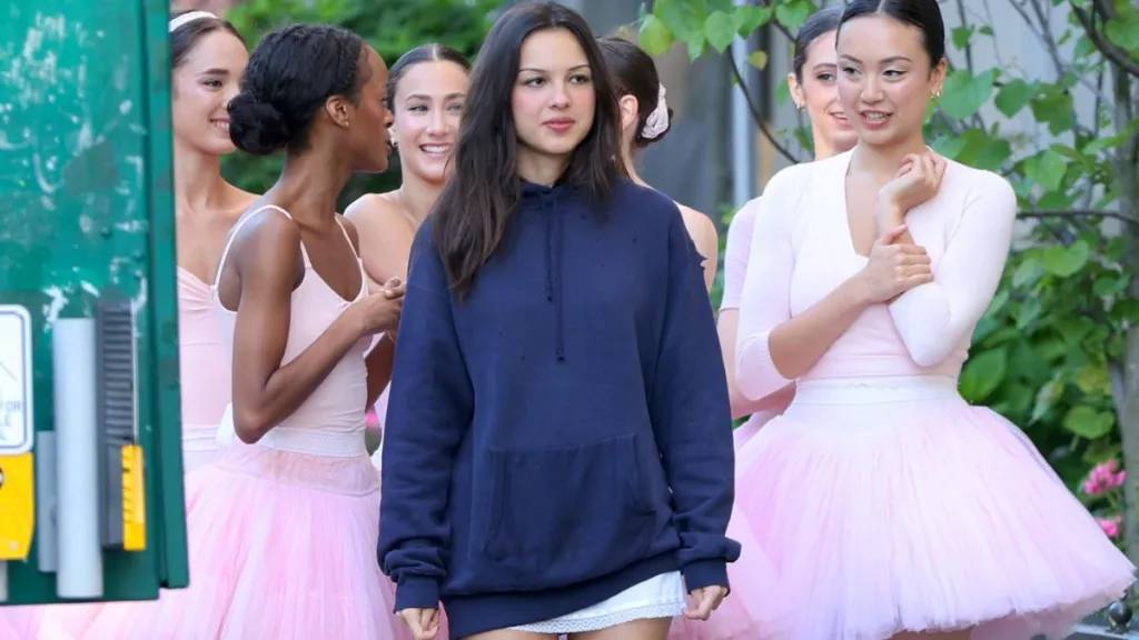 Olivia Rodrigo's $129 Attega Micro Miniskirt Nearly Disappears Under Hoodie