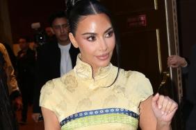 Kim Kardashian's Figure-Hugging Dress Features a Thigh-High Slit