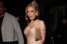 Doja Cat Shows off Cleavage in Nude Dress Held by the Thinnest Strings
