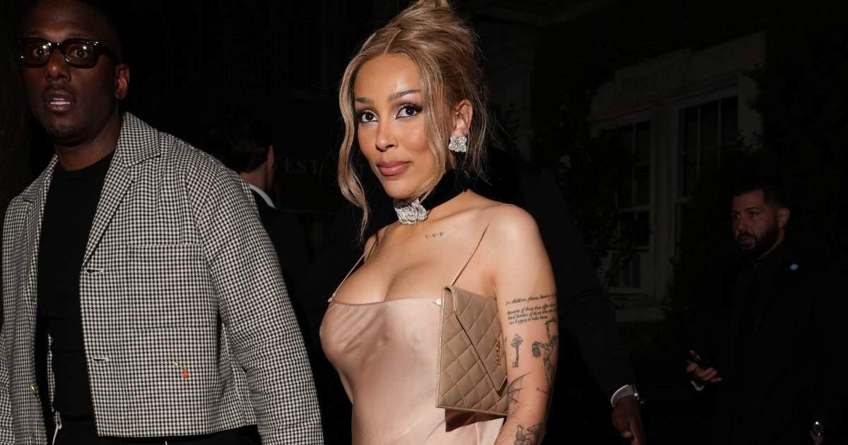Doja Cat Shows off Cleavage in Nude Dress Held by the&hellip;