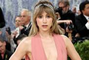 Suki Waterhouse Goes Pantless in Thong & Sheer Tights Under Auter Jacket