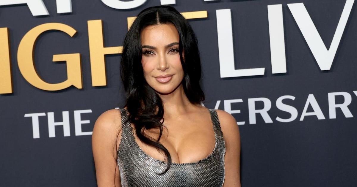 Kim Kardashian’s Ab-Baring Crop Top Plunges Dangerously Low