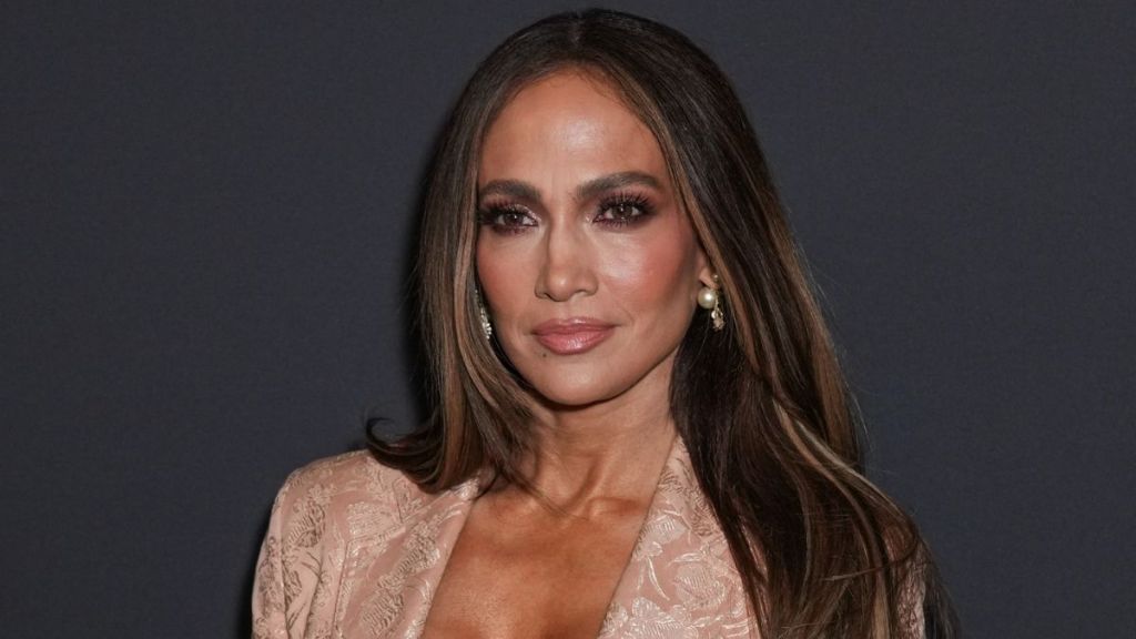 Jennifer Lopez Gives a Risqué Peek at Her Bralette in Bold Open Blazer Look
