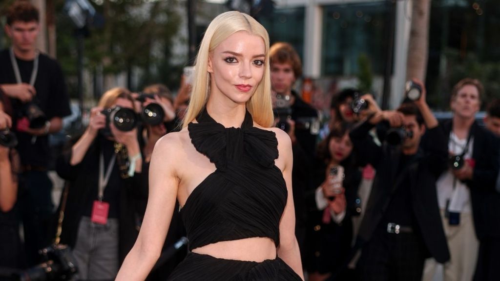 Anya Taylor-Joy's Dior Crop Top Literally Hangs by a Strap Over Miniskirt