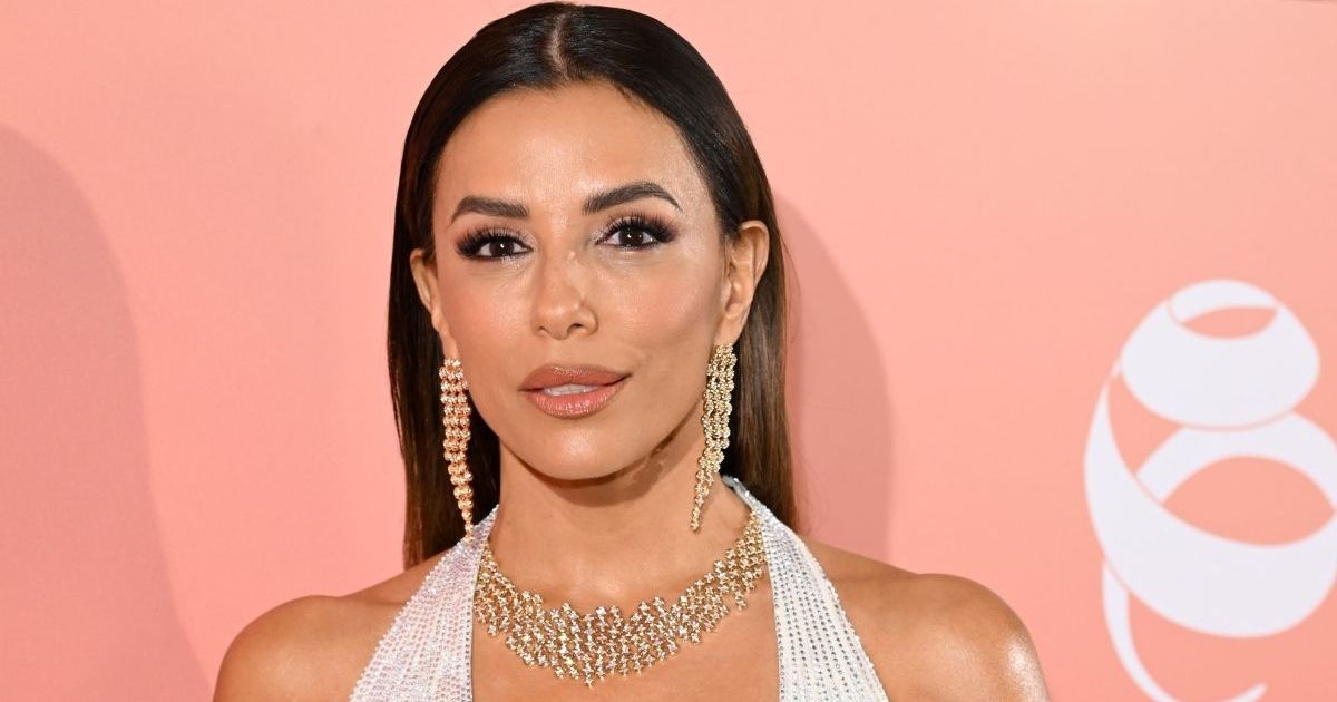 Eva Longoria Nearly Pops Out of Curve-Hugging Dress With&hellip;