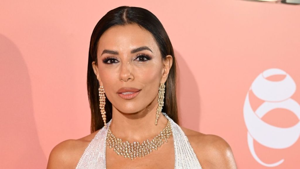 Eva Longoria Nearly Pops Out of Curve-Hugging Dress With Racy Slit