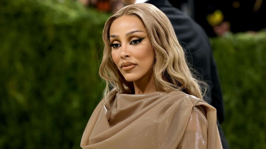 Doja Cat Risks It All in Plunging Named Collective Top Held by a String