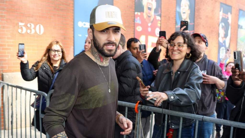 Zayn Malik Event Interrupted by Flying Water Bottles