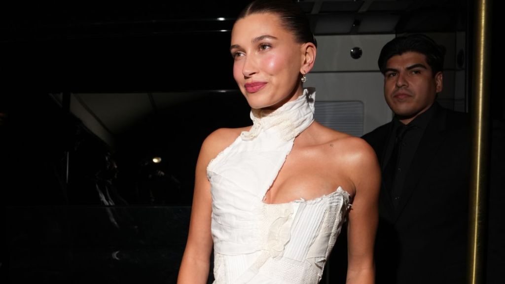 Hailey Bieber Gets Cheeky in $15K Alaia Coat as Dress With Bold High Slit