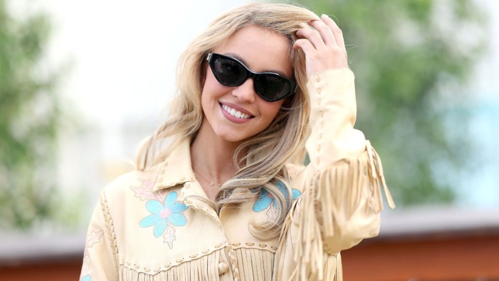 Sydney Sweeney’s Plunging Catsuit Gets Upgrade With Dior Bag in ‘Euphoria’