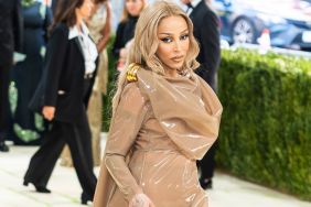 Doja Cat Boldly Leaves Balenciaga Shirt Unbuttoned for Plunging Look