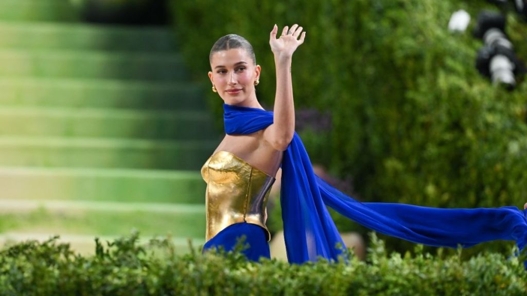 Hailey Bieber's Tiered Alaia Skirt Adds Funky Touch to Bold Plunging Top