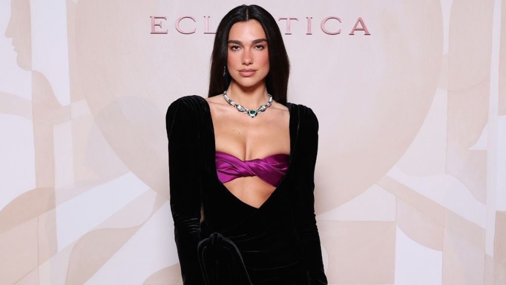 Dua Lipa's Neckline Dips Dangerously Low in Open-Top Look