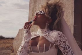 Doja Cat Nearly Pops Out of Plunging Corset That Exposes Her Thong