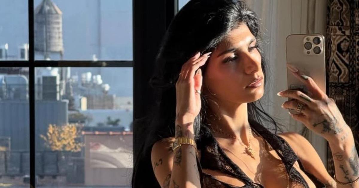 Mia Khalifa’s Curves Almost Spill Out of Her Plunging Corset Top