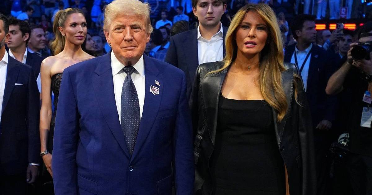 Melania Trump's Jacket Can't Quite Hide the Drama of Her Plunging Dress