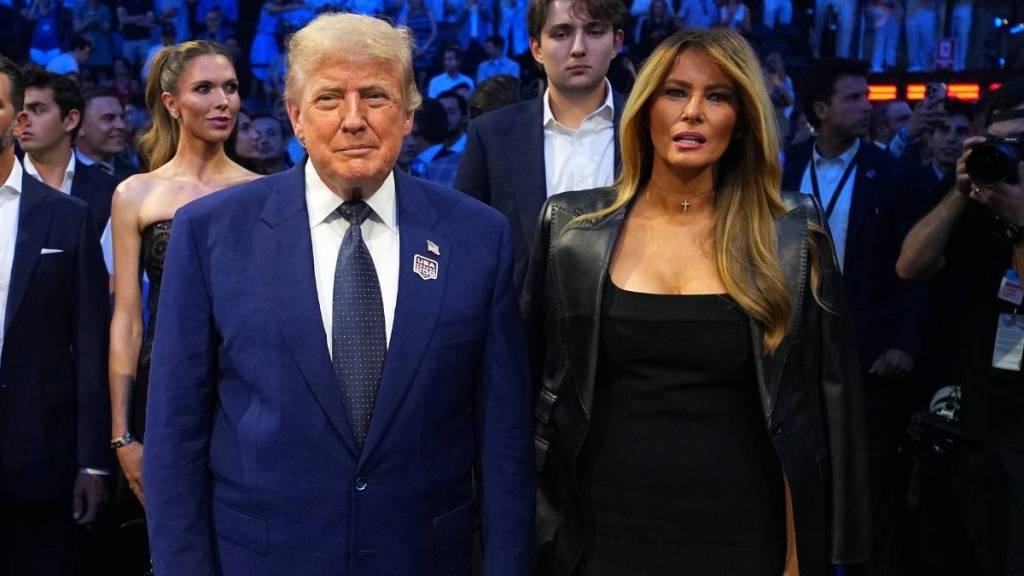 Melania Trump's Jacket Can't Quite Hide the Drama of Her Plunging Dress