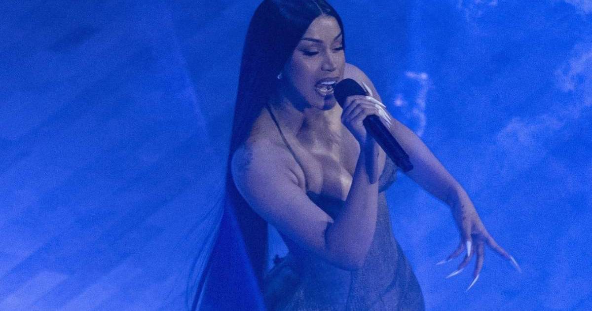 Cardi B’s Jennax Latex Top Is Held up by a Single String…