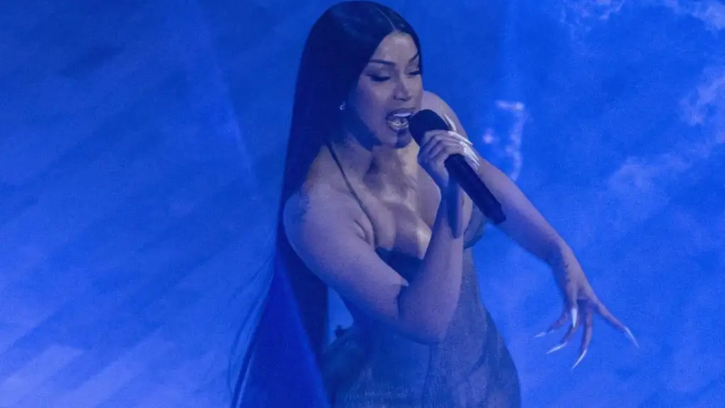 Cardi B's Jennax Latex Top Is Held up by a Single String for Knicks Game