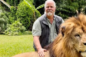 Doc Antle posing with a lion