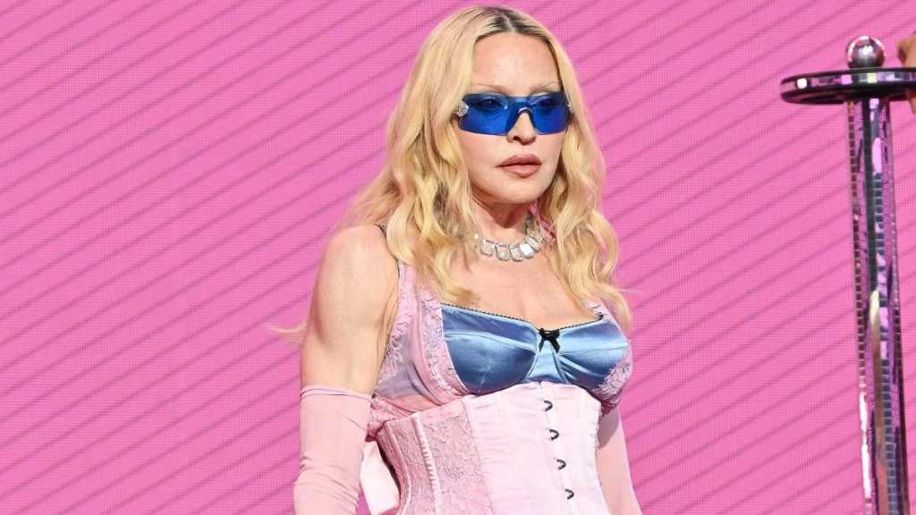 Madonna Layers Dolce & Gabbana Corset Over Lingerie-Coded Sheer Lace Bodysuit