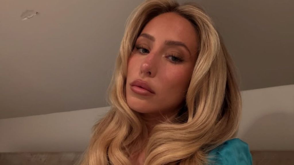 Alix Earle Leaves Chloe Shirt Unbuttoned for Deep Plunging Look