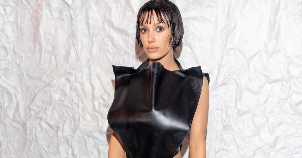 Bianca Censori Stuns in Skin-Tight Latex Catsuit Featuring Huge Cutout