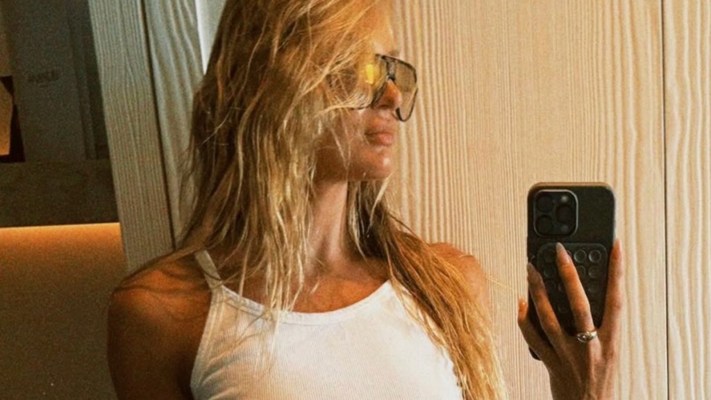 Candice Swanepoel’s Peeking Top Almost Overshadows Her Leg-Baring Mini Skirt
