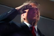 Donald Trump’s National Anthem Salute Sparks Questions About Flag Code Rules